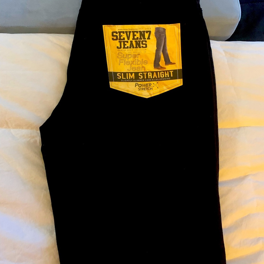 Black pair of men’s jeans. Never worn tags still present